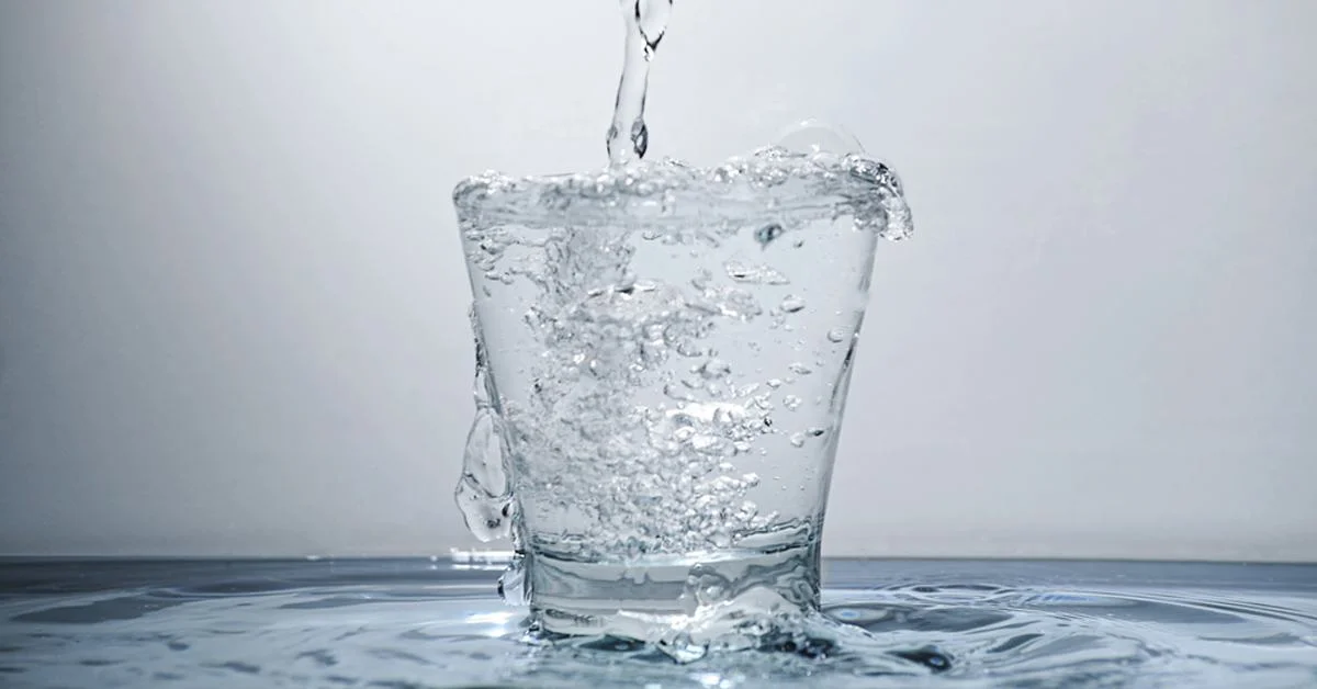 glass-of-water-overflowing-large.jpg