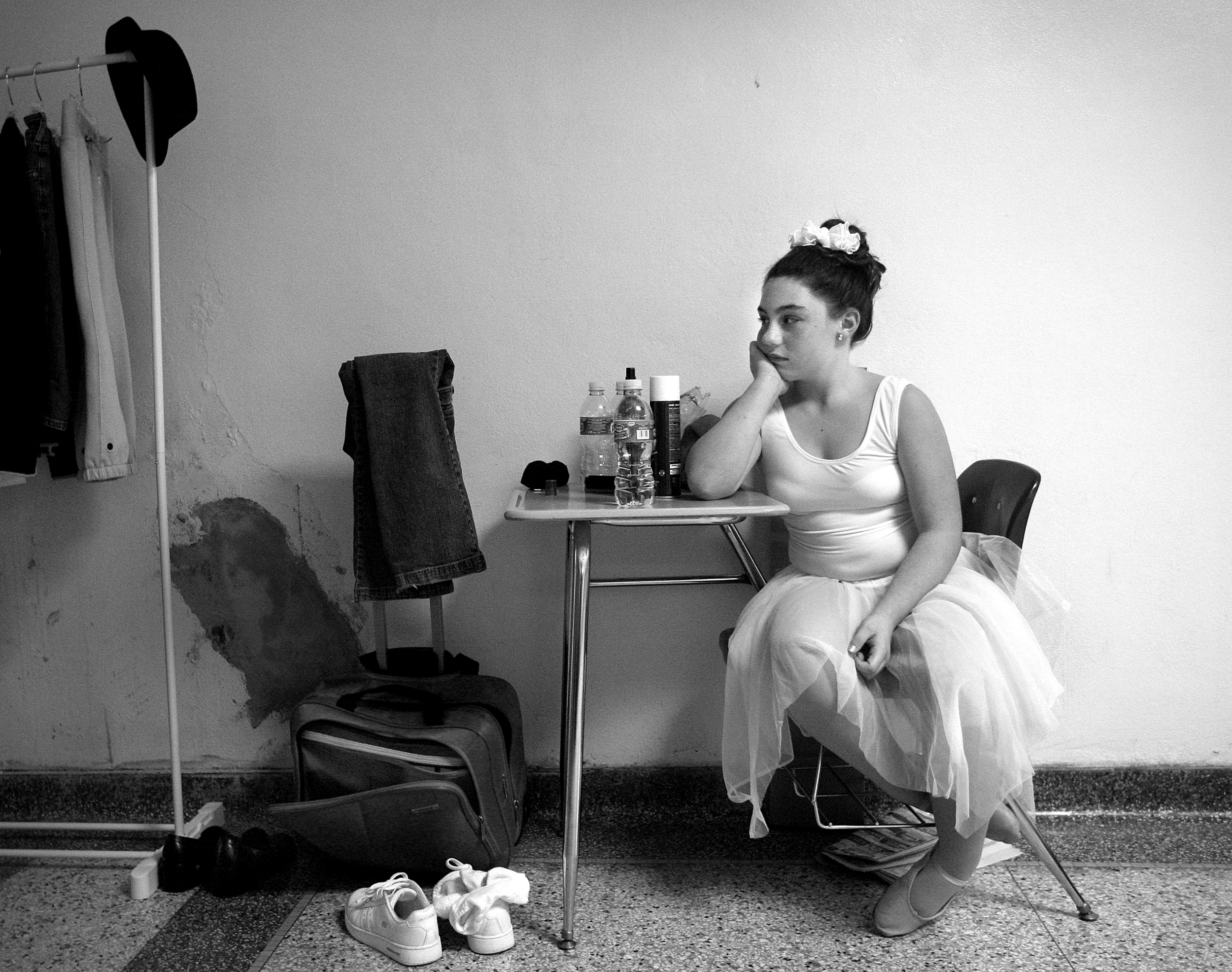  Taylor Bramblett of Hannibal, Mo. waits near her basement "dressing room" in the hallway of Hannibal High School after performing a dance number in the Miss Pre-Teen contest held in conjunction with the Miss Hannibal contest. 