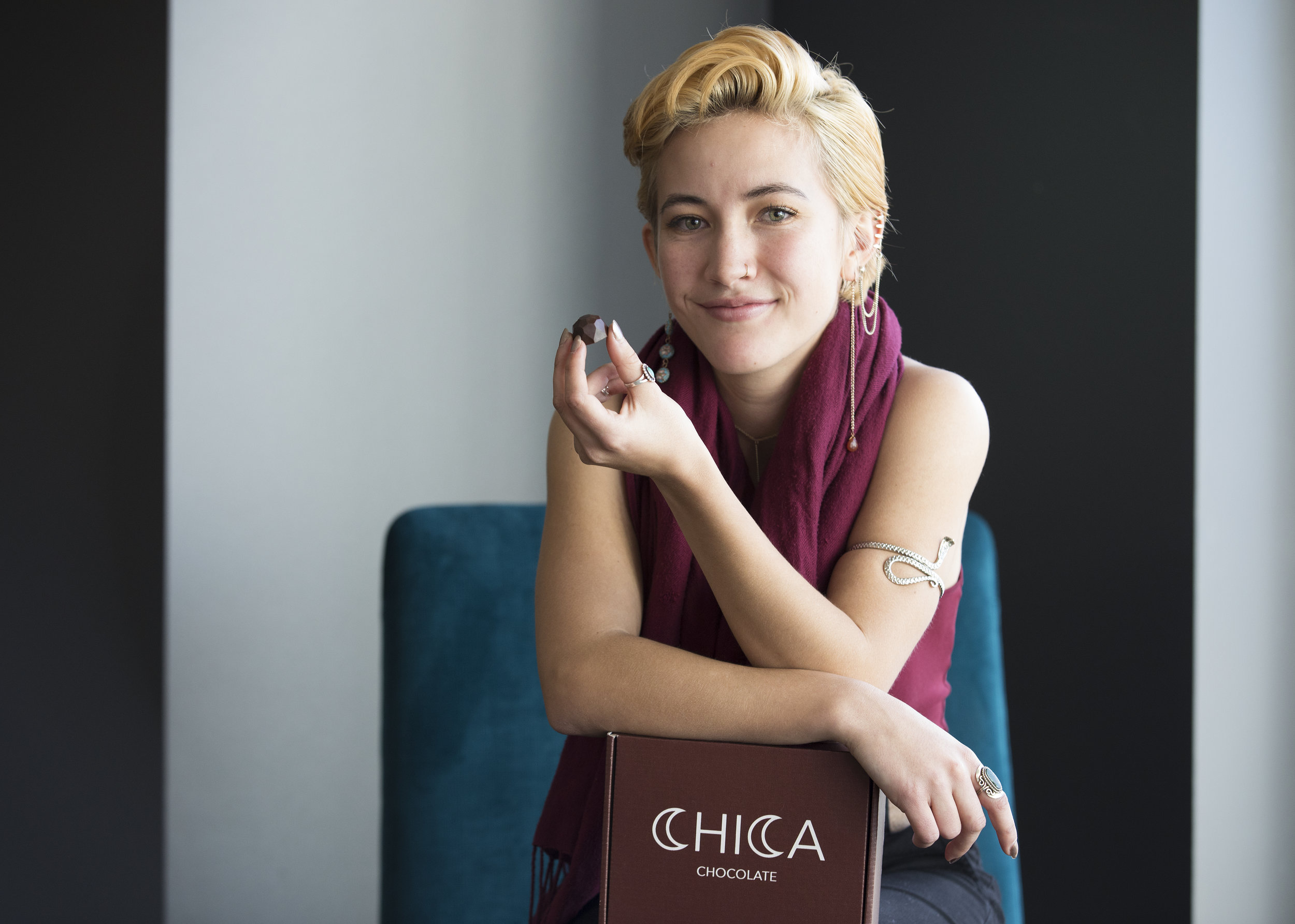  Cassidy Lam poses with one of her chocolates from the company she has started, Chica Chocolate. Lam hopes to revolutionize and help girls love their periods by selling them period soothing chocolates made from Chinese herbs.  