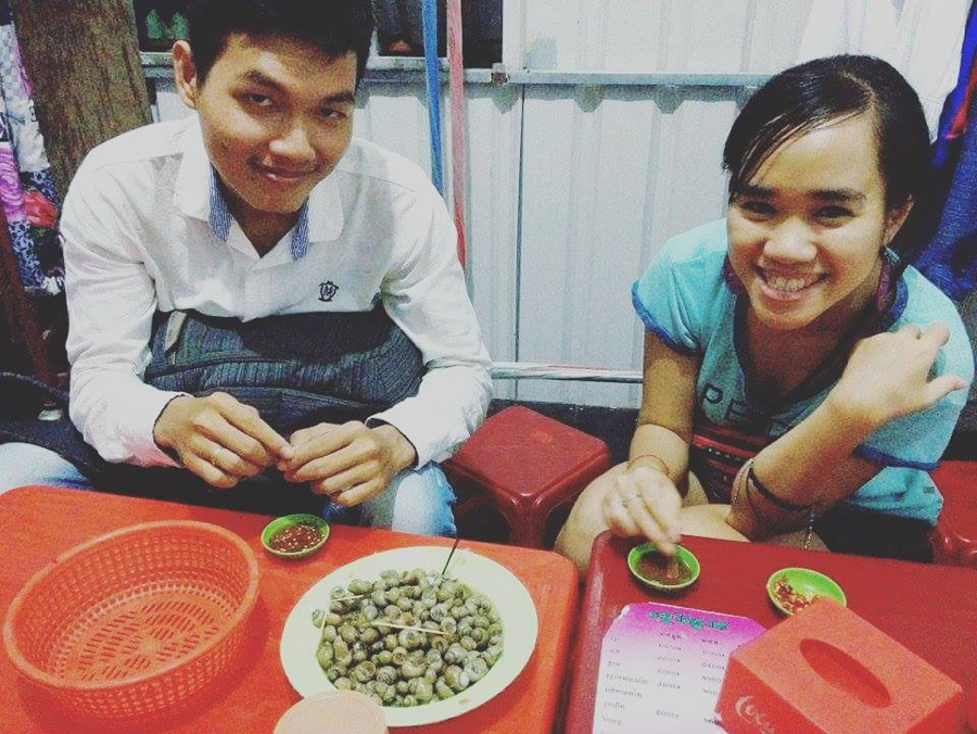 Food buddies: Porchhay and Thuy enjoying snails