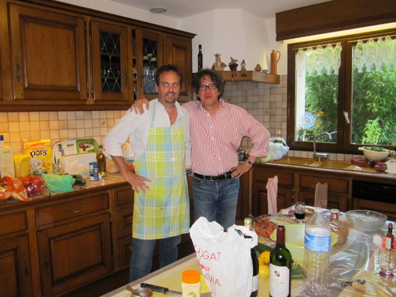      Michael Purugganan  (right) with Larry Gottschamer making dinner at Malika’s house in Rennes.     ​ 