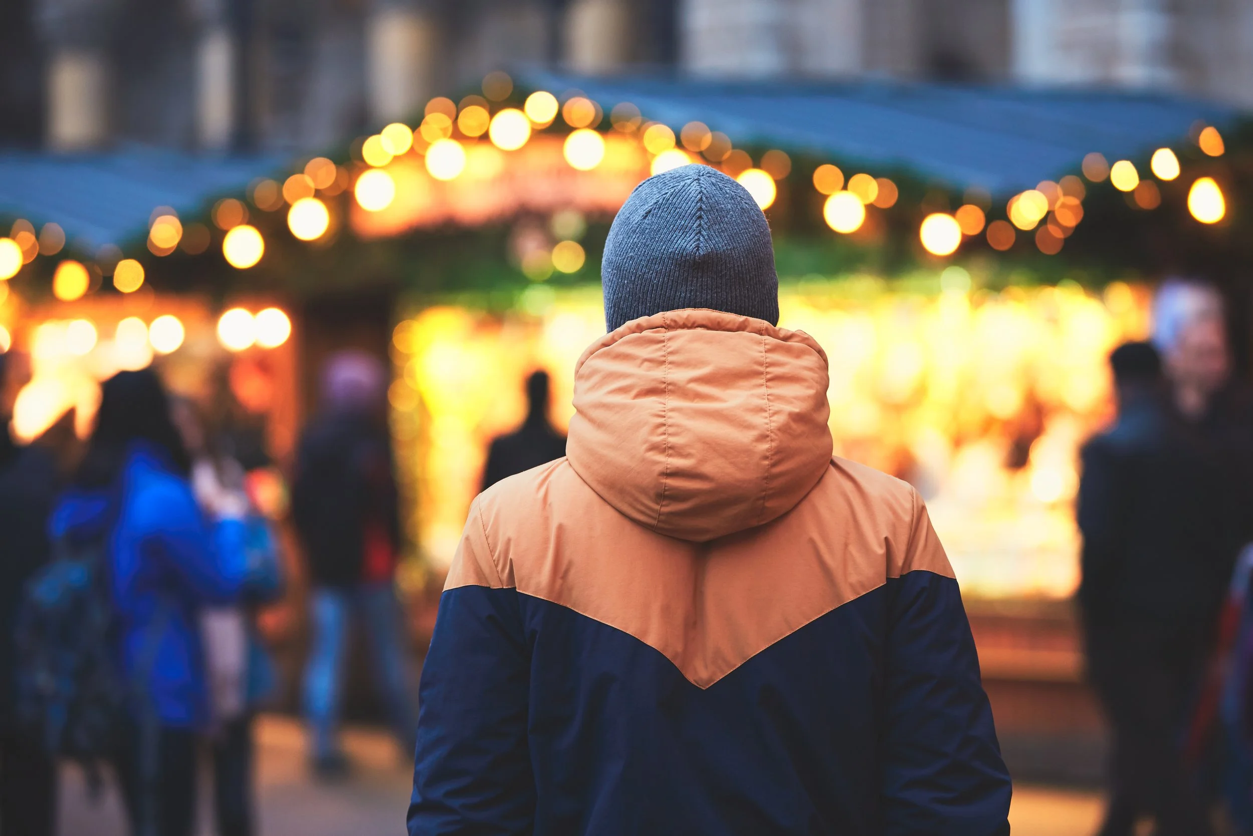 man-in-christmas-market-PCNAV69.jpg