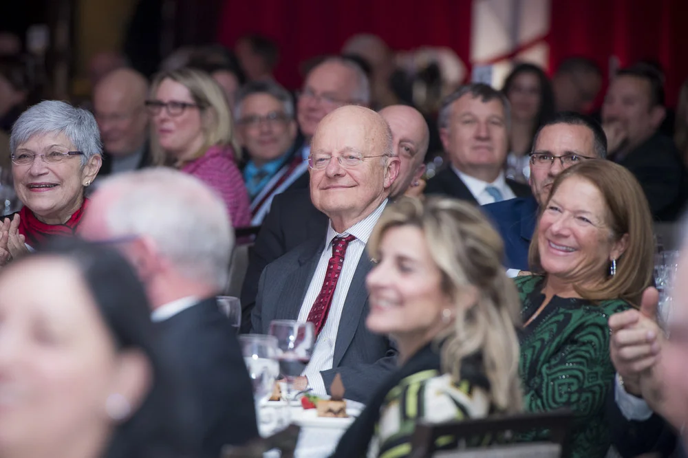Director of National Intelligence James Clapper listens to speeches given by colleagues and friends during an Intelligence and National Security Alliance (INSA) dinner in his honor. Dec. 14, 2016