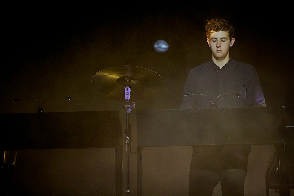Jamie XX commanding the backdrop for The xx (Photo Credit: Robert Castro)