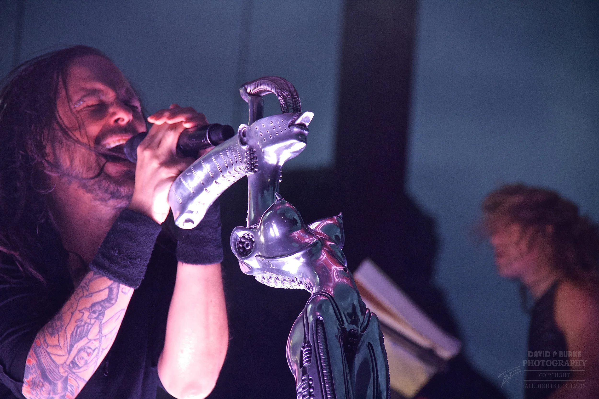 Jonathan Davis of KoRn with his awesome mic stand. Can you guess who designed it? (Photo Credit: David Burke)