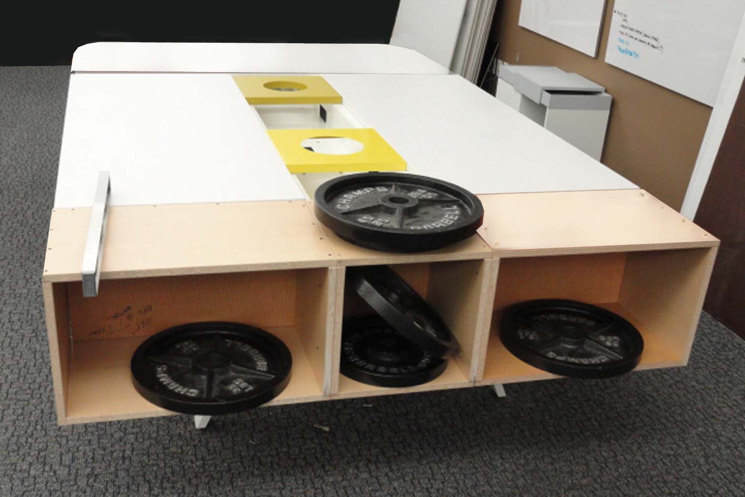 Stress testing frame with suspended storage.