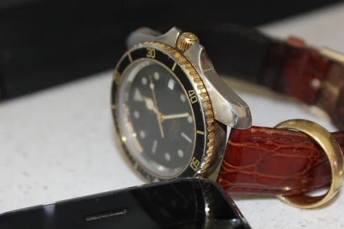 I've had this battered Tag Heuer watch for decades, a version of which also appears on Alex Morgan's wrist. Though Morgan's does not have a wedding band on it or near it!