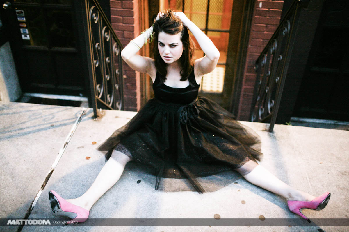 street angel resting in pink heels.jpg