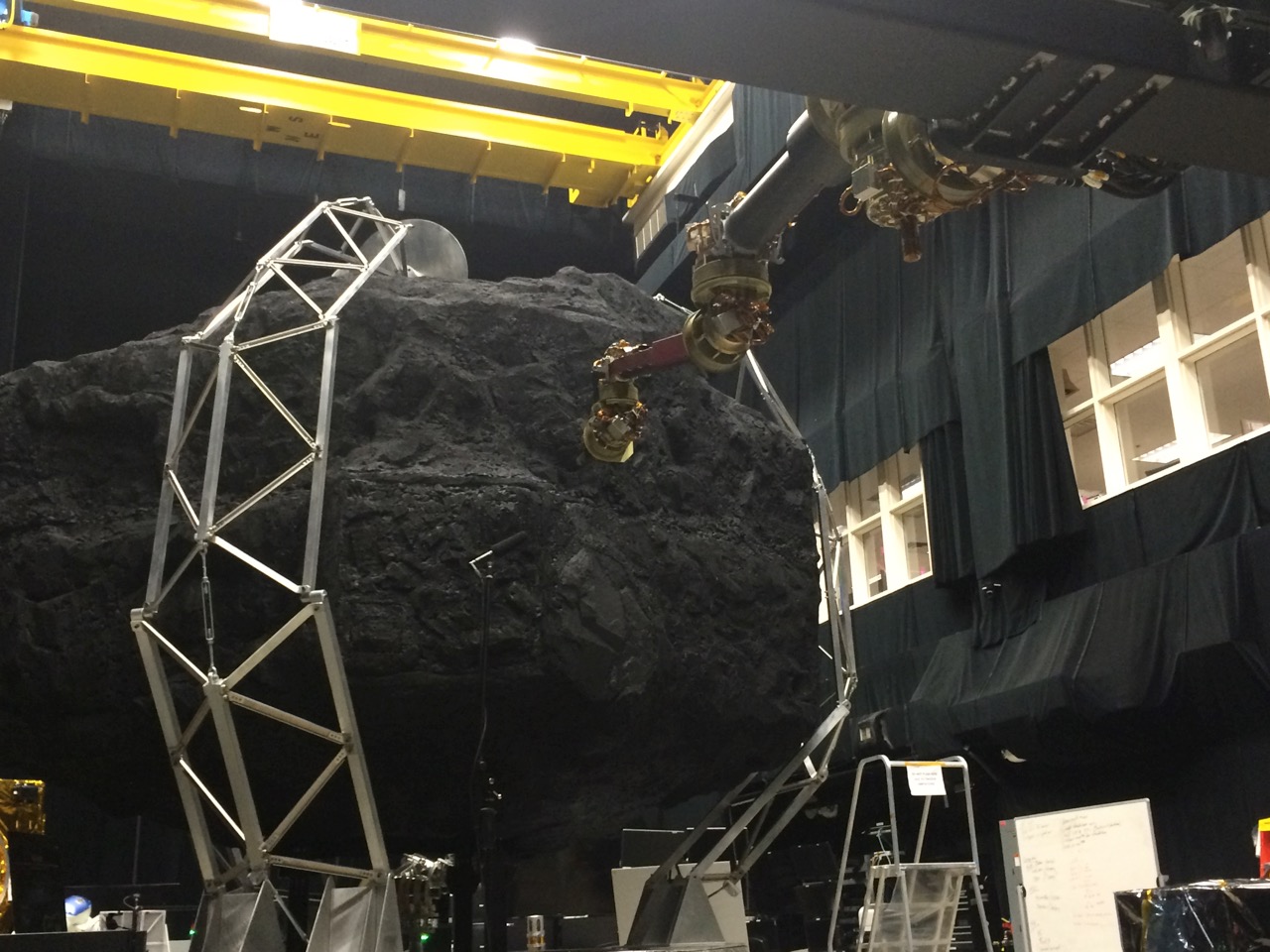 In the Robotics Operation Center at NASA’s Goddard Space Flight Center in Greenbelt, Maryland, an engineering development unit of the robotic capture system is tested at full scale. Credits: NASA