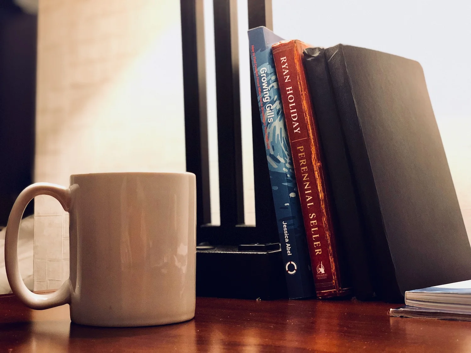 " Growing Gills " is a great little book for getting focus and being productive the context of creative work. 