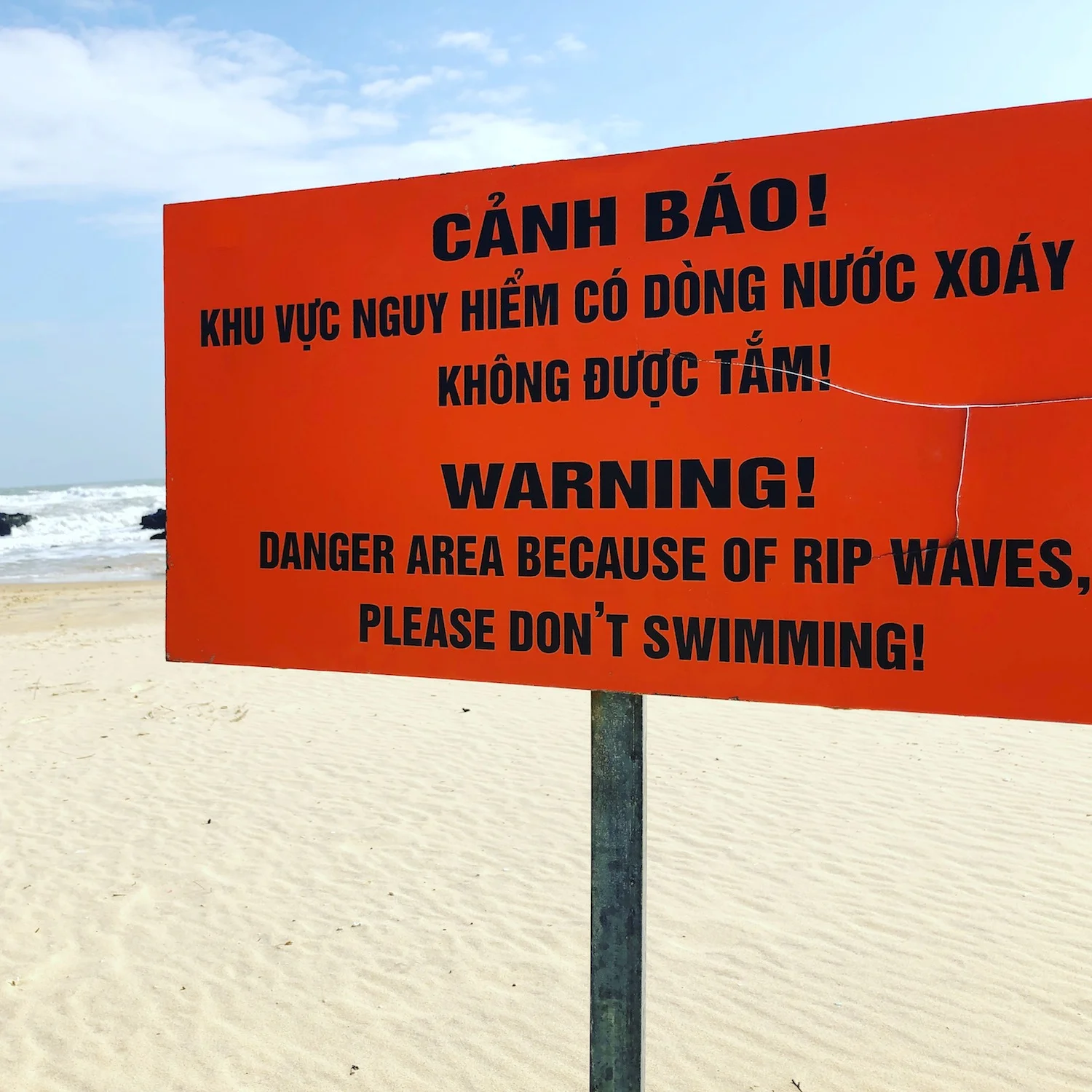Insight: "Swimming" is the wrong verb tense. Outsight: The waves behind this sign could kill you. RIP. 
