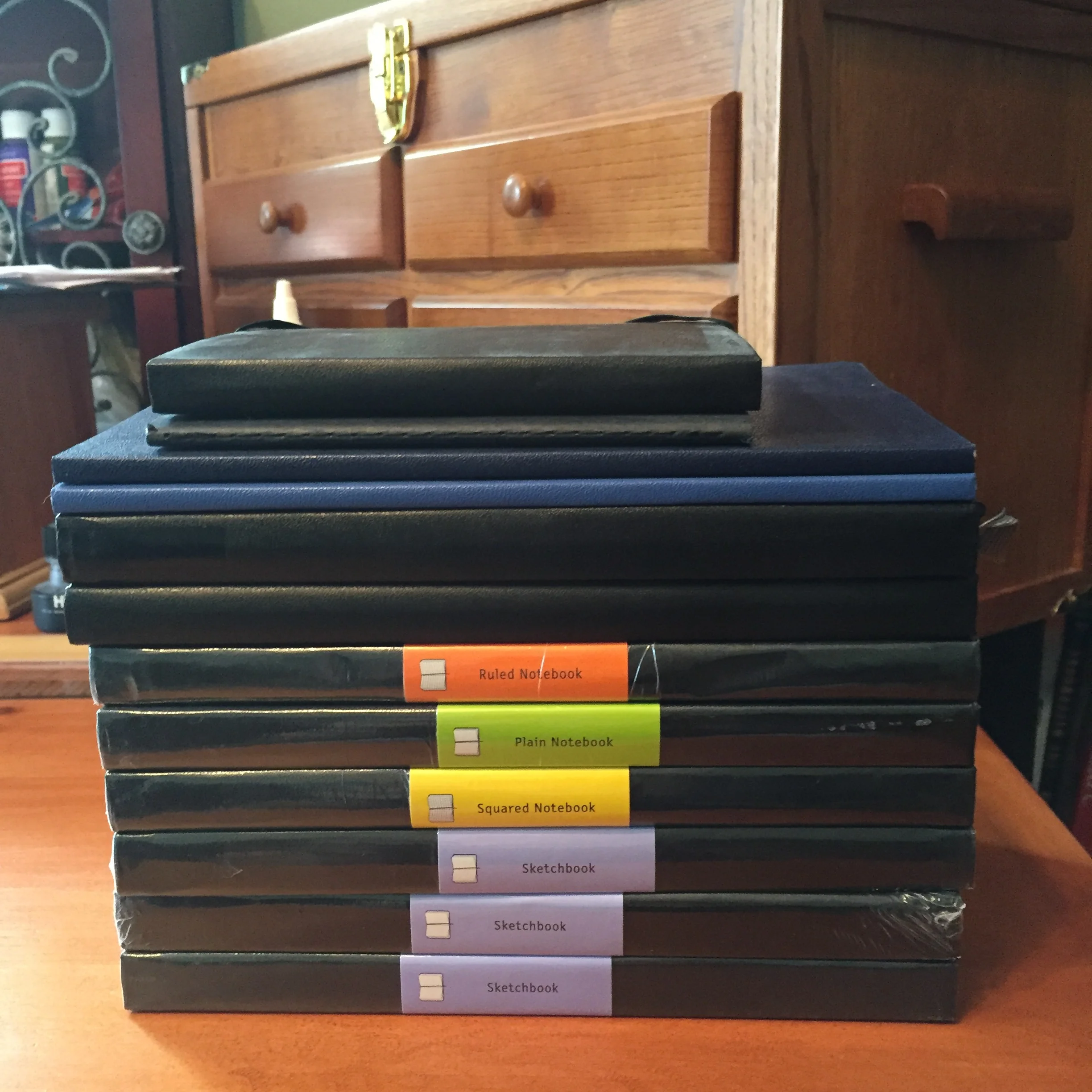 Giant stack of Moleskine notebooks