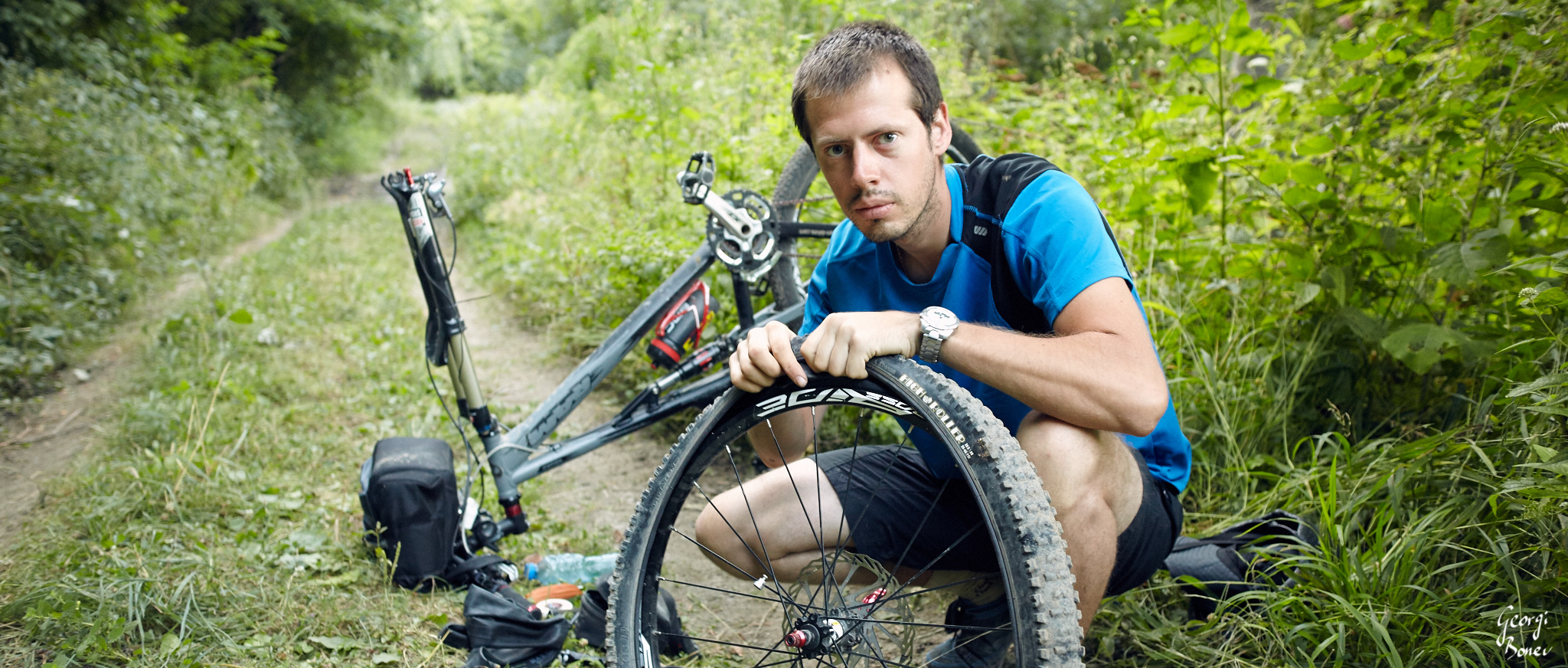 Dani fixing his flat tire, Mt. Stara planina, Bulgaria