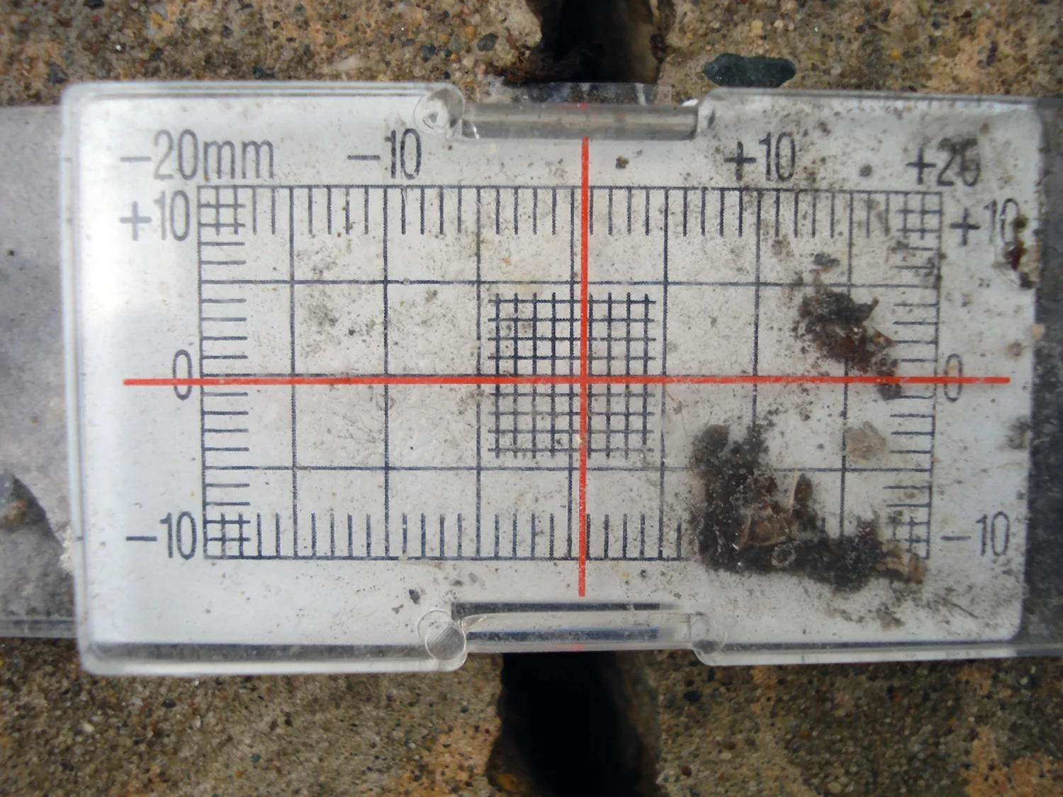 Figure 8. Monitoring a pre-existing crack for new changes. Photo credit: Angie Shyrigh.