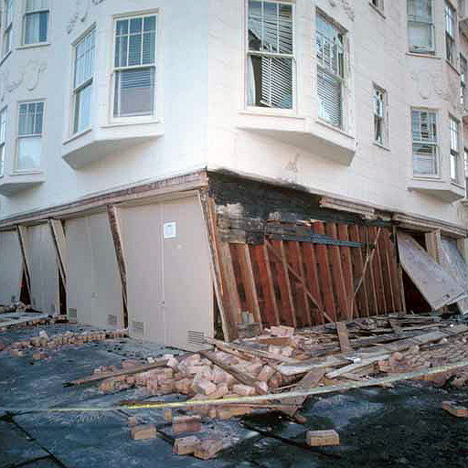 Insufficient shear walls caused catastrophic structural damage to this soft-story San Francisco residential complex during the 1989 Loma Prieta quake. Photo credit: USGS/J.K. Nakata.