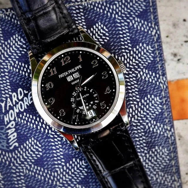 The simply spectacular #patekphilipe 5396G annual calendar with a special black @tiffanyandco dial, breguet numerals, inverted moonphase and luminescent hands…limited to 100 pieces and one of the few modern era Patek guaranteed to be collectible… by youcanneverhaveenough http://ift.tt/1I0gAa9