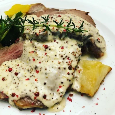 Veal with peppercorn sauce