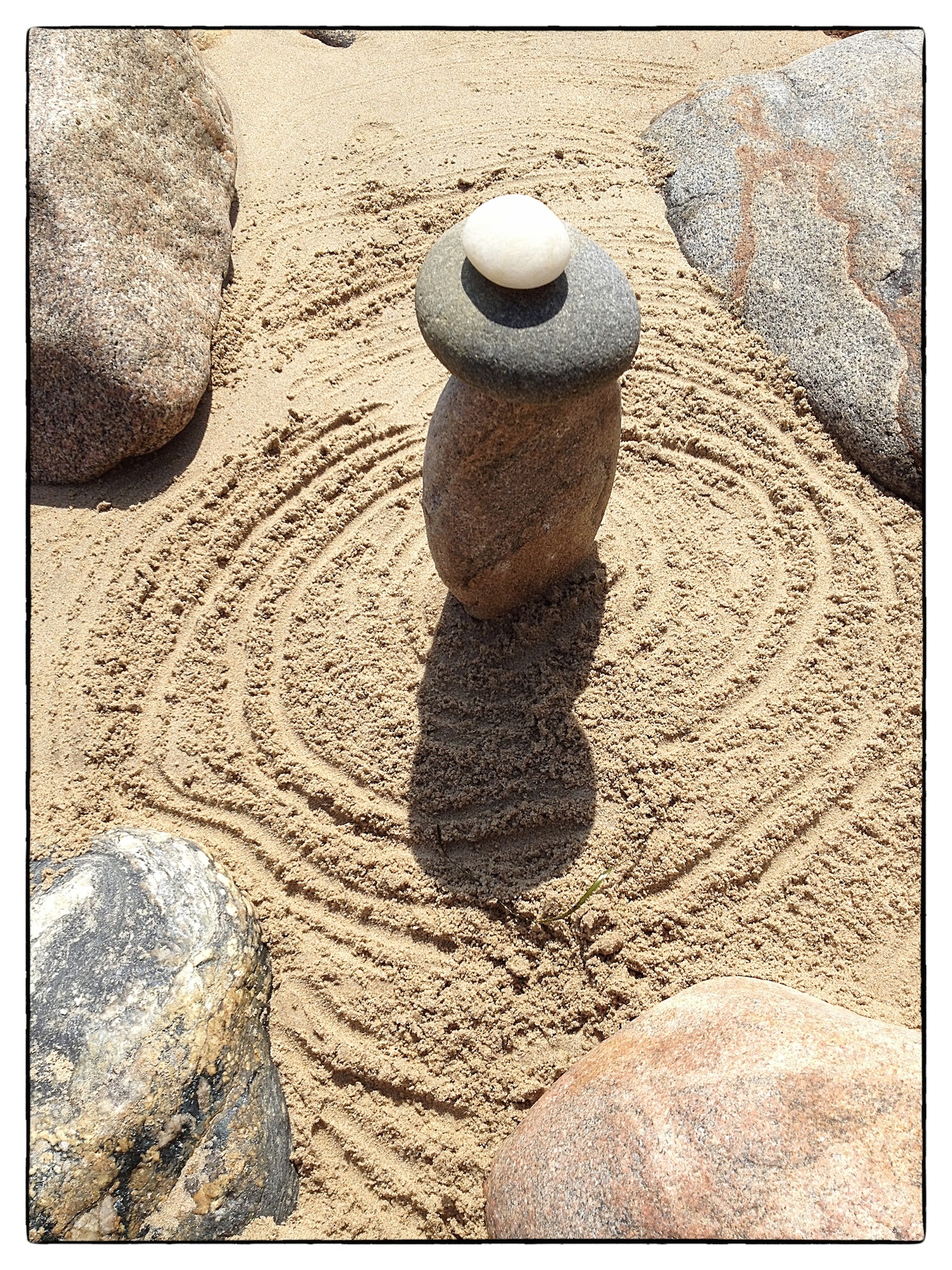 Rock and sand sculpture on the beach on Block Island, R.I., shot August 5, 2012.