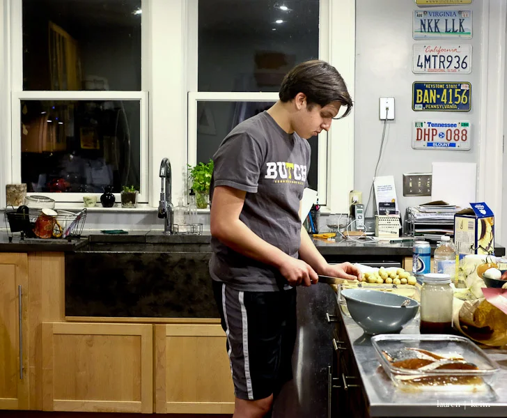 January 13 . Cal cooked salmon this week (I love how crazy messy our kitchen looks when one 15 year old cooks! And has a snack after school. ) | Fuji X-E2, 35mm