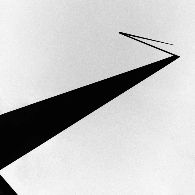 I don't remember where this was but it's a lamp-post (or was, originally). Strictly, I wasn't waiting and I knew I wanted to do this for a while, but it was taken on a break between shoots.