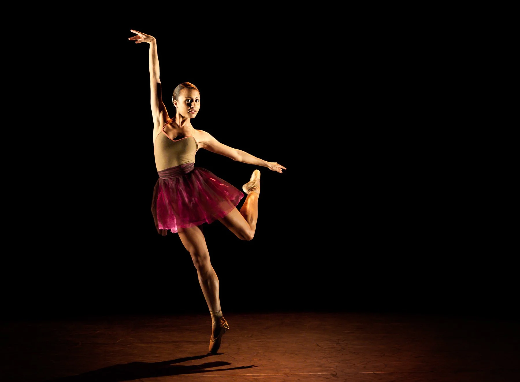 Ballet dancer on dark background