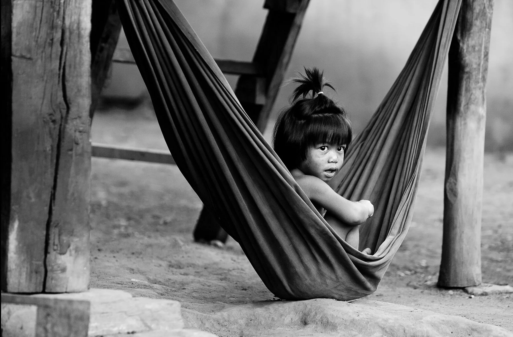Young boy in a hammock in Nepal
