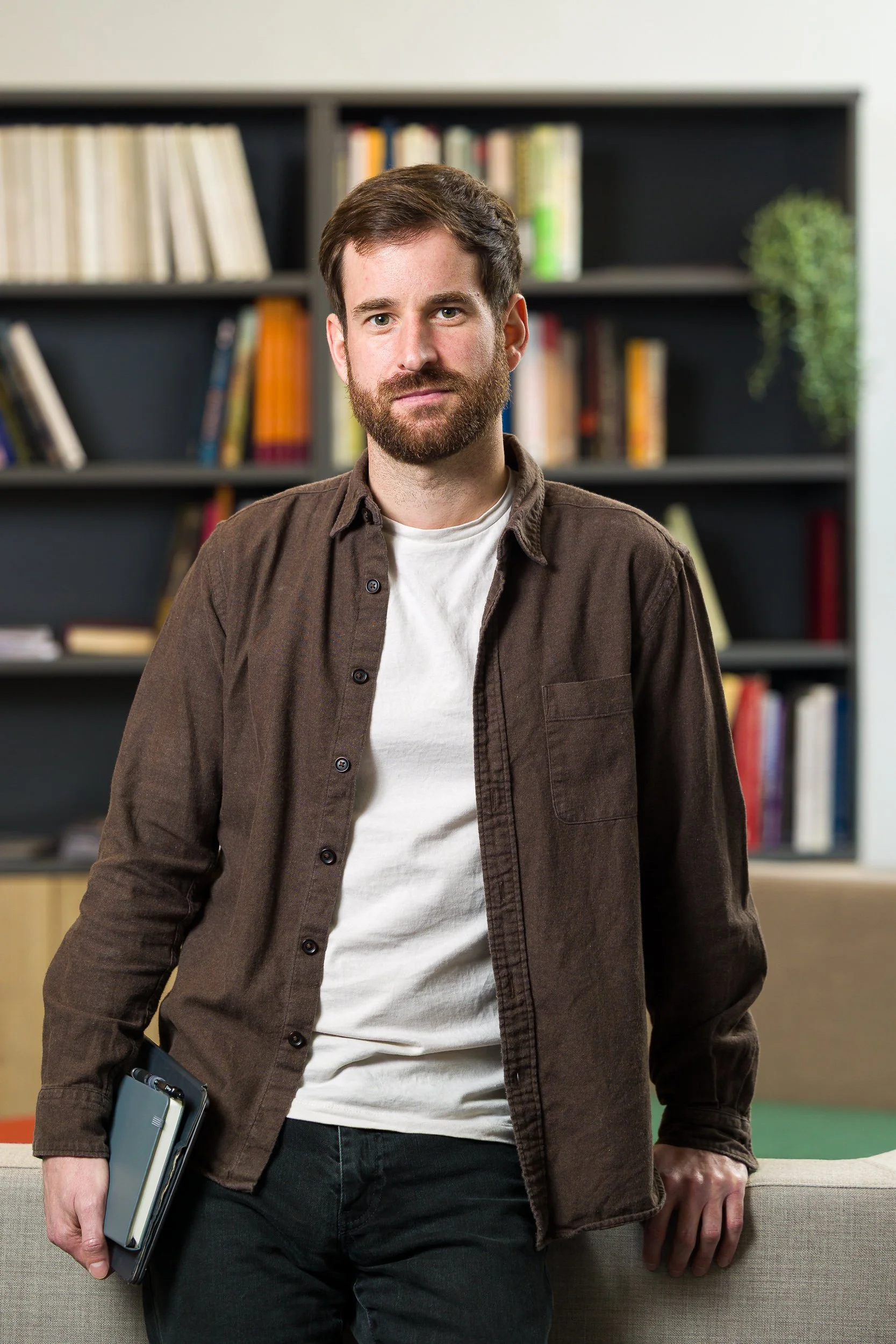 Portrait of a university student in a common room