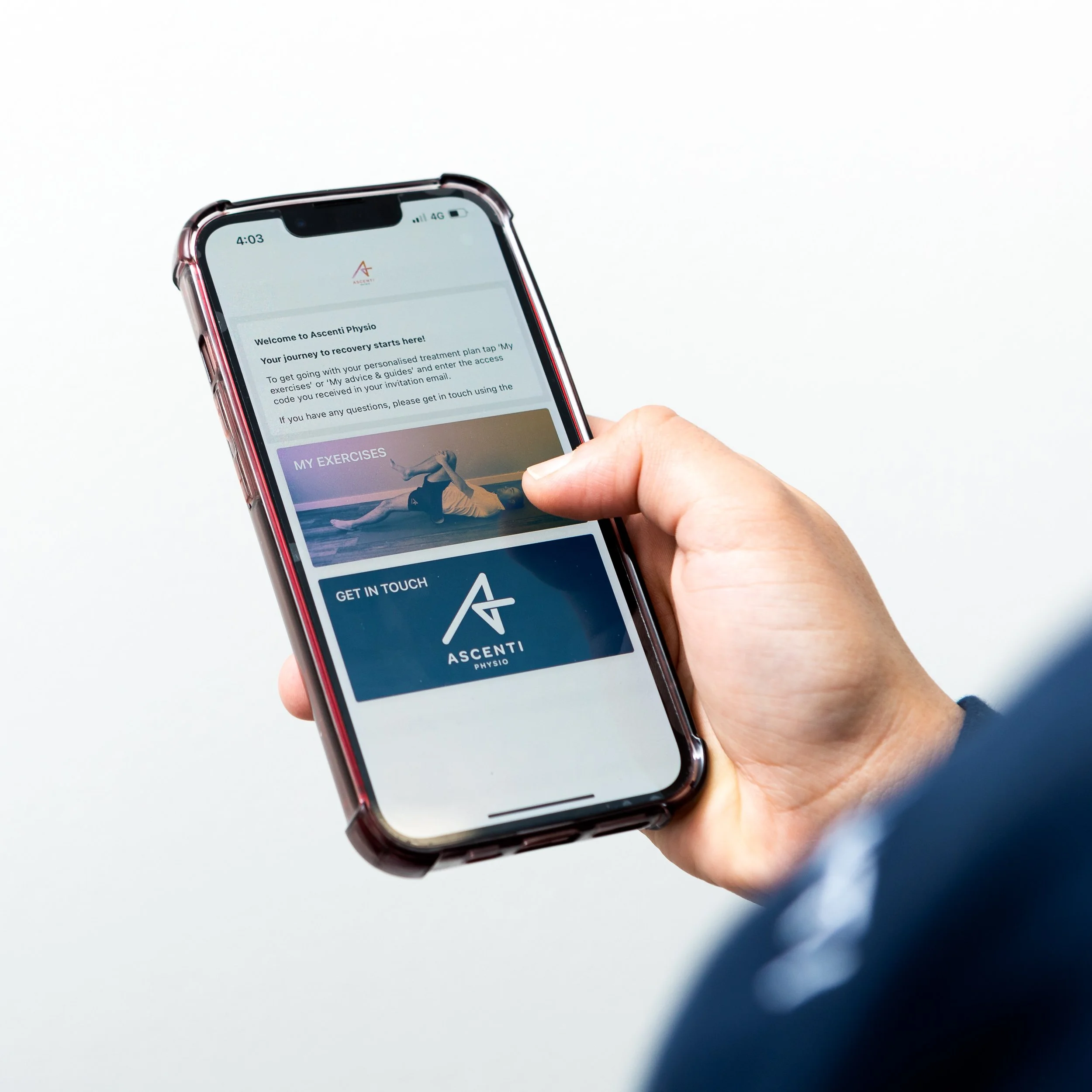 A hand holds a phone