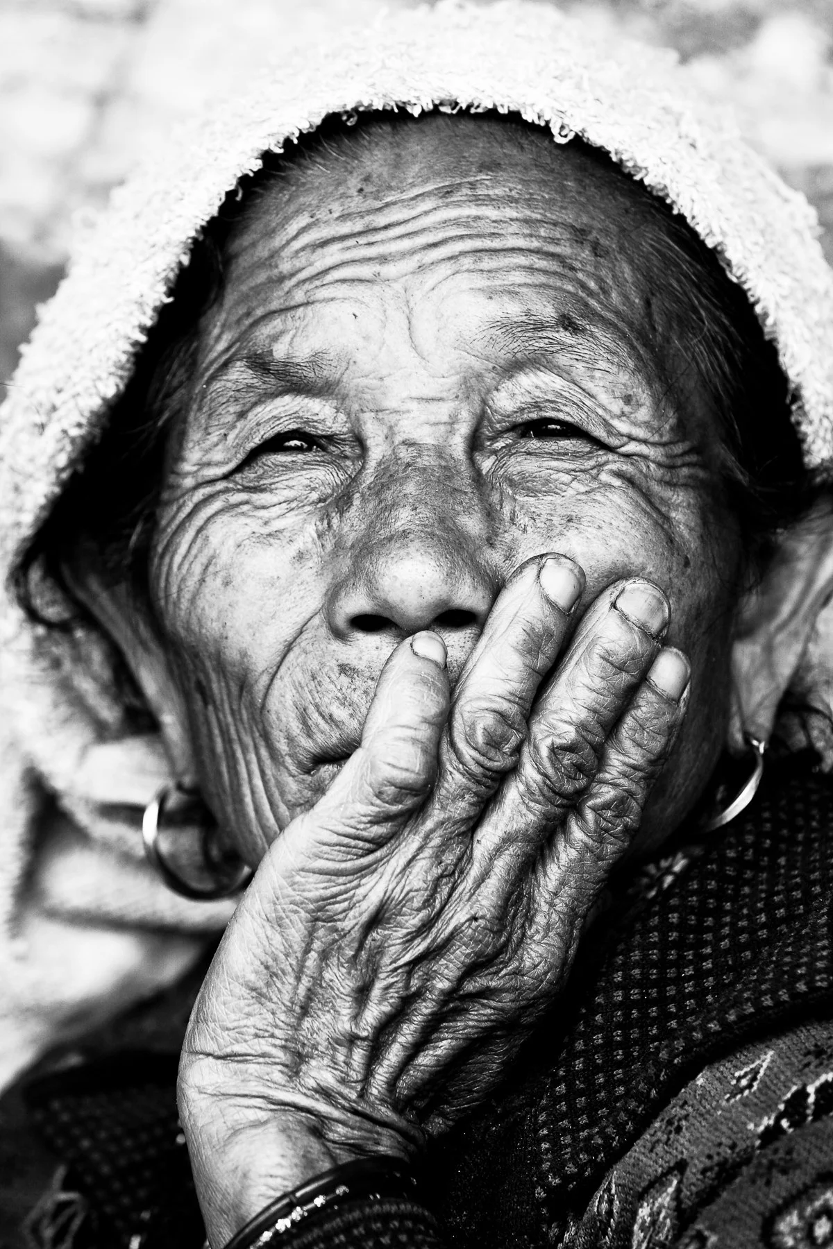 Black and white image of an old lady in Nepal