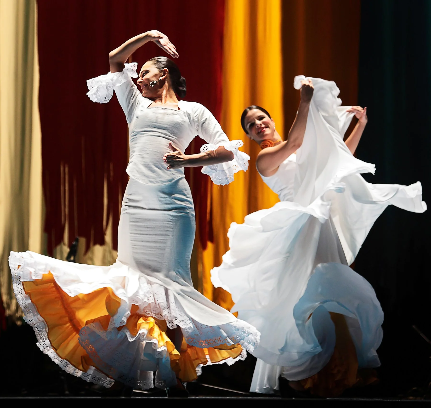 Two ladies dance flamenco