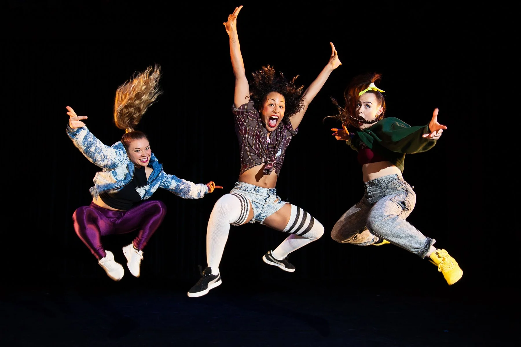 Promo image for East London Dance of three girls jumping