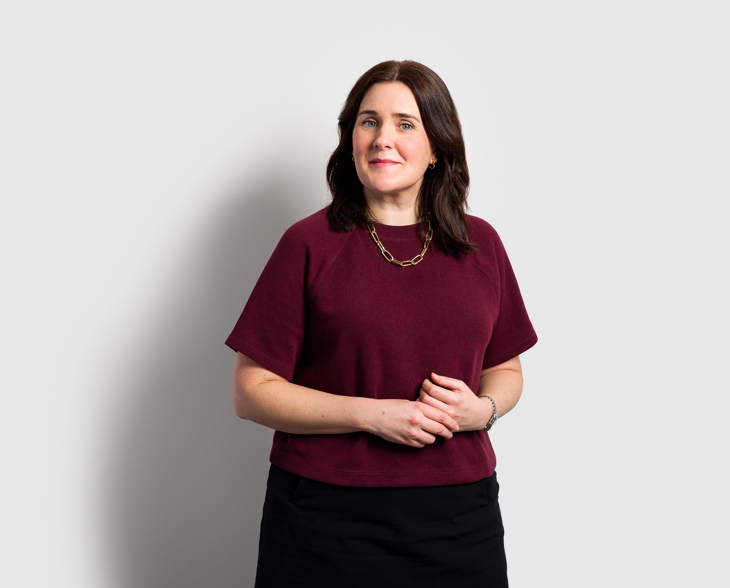 Business portrait on a plain background