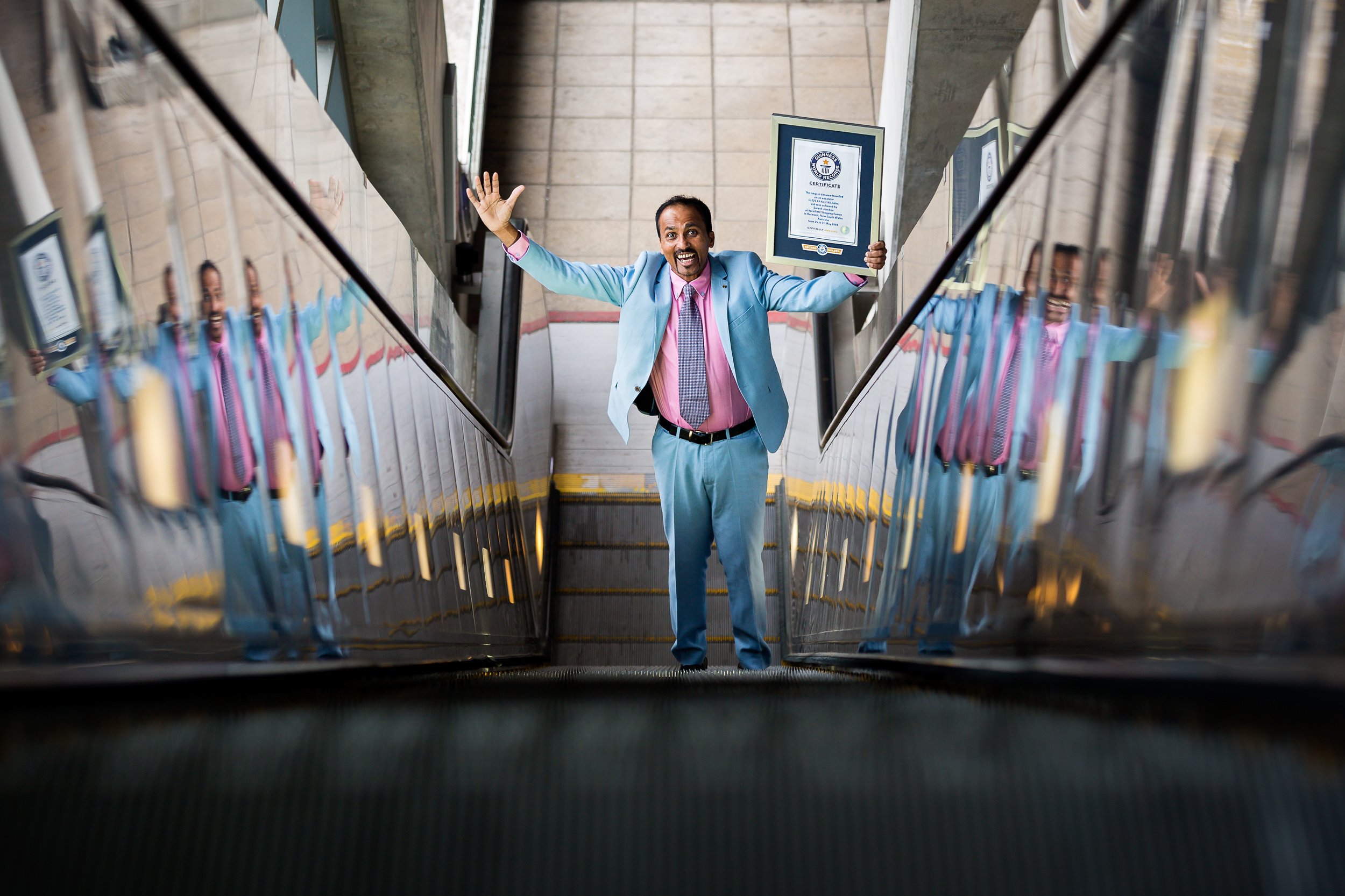Suresh Joachim, who holds more than 60 world records, on an escalator