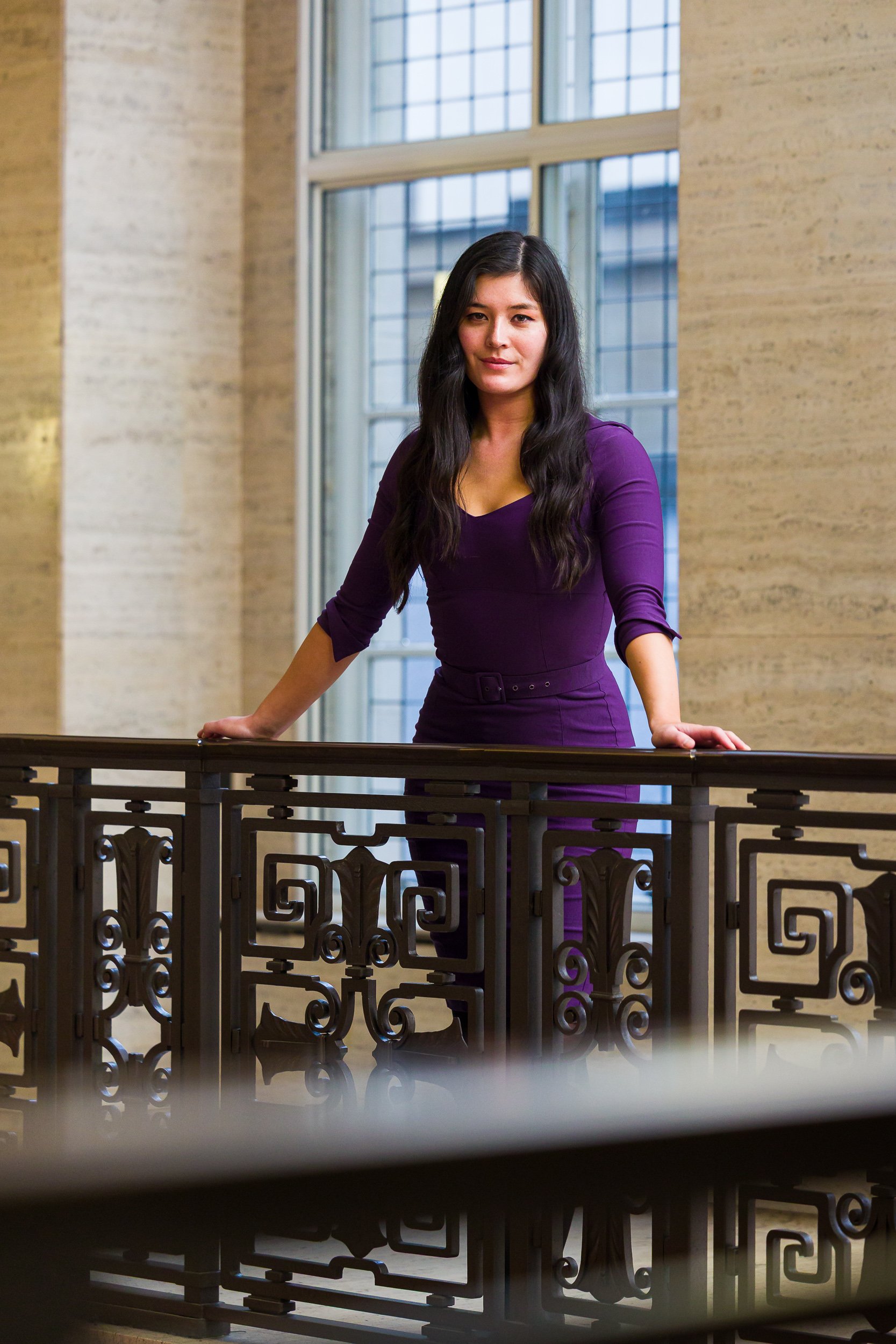 Portrait of a graduate in Senate House, University of London