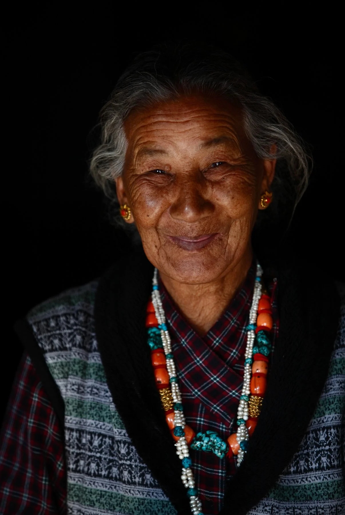 Portrait of a smiling lady inside her house