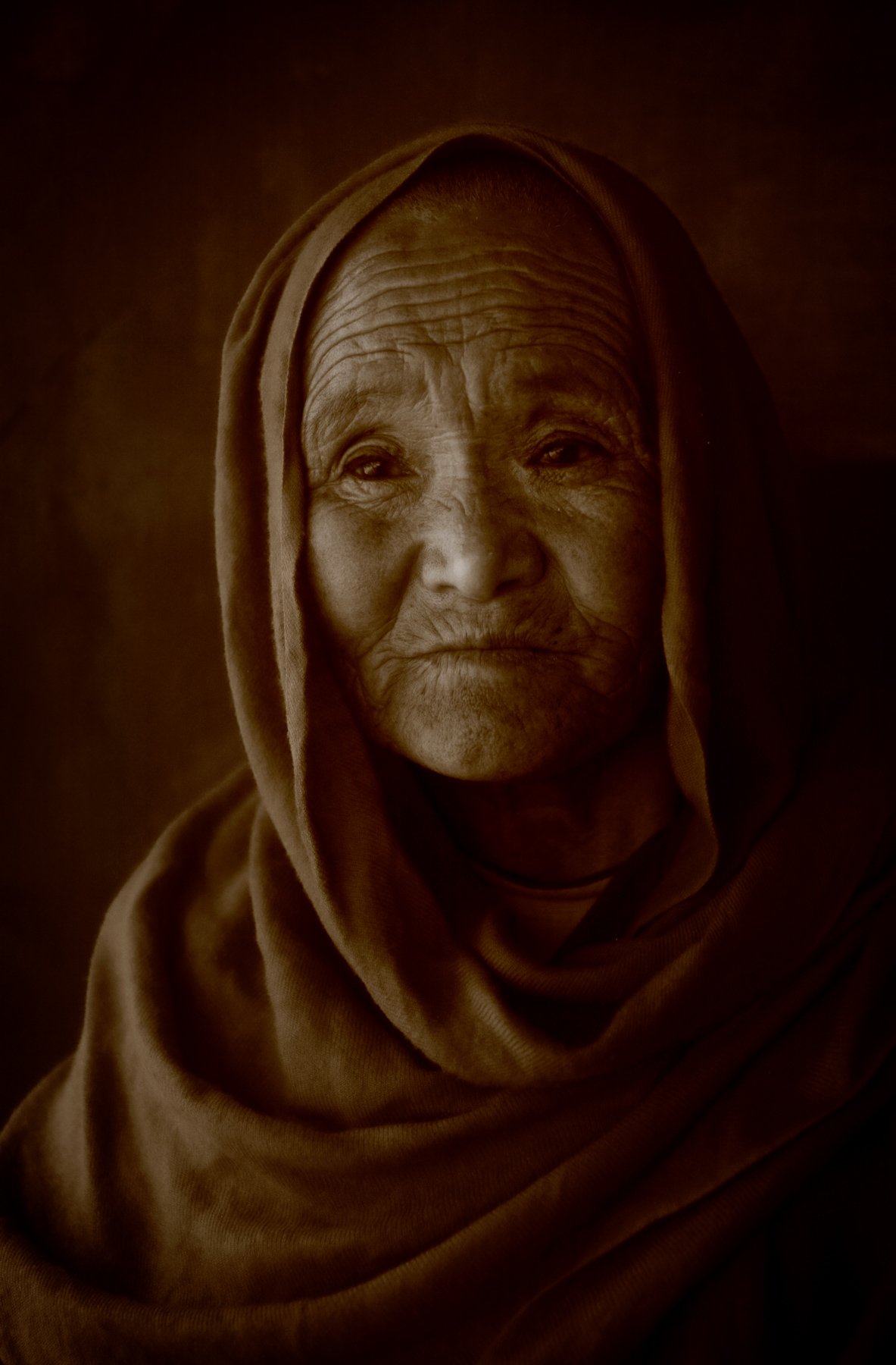 Headshot of an Indian lady in a shawl