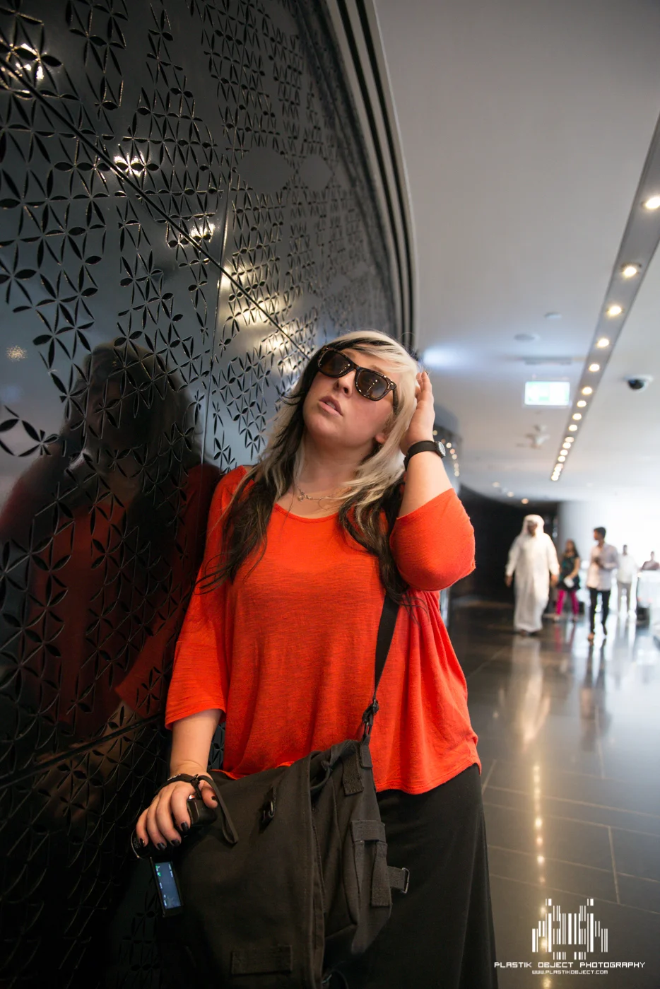 Shelby mockingly posing on some odd wall. A few others were doing it, so she thought she would too.