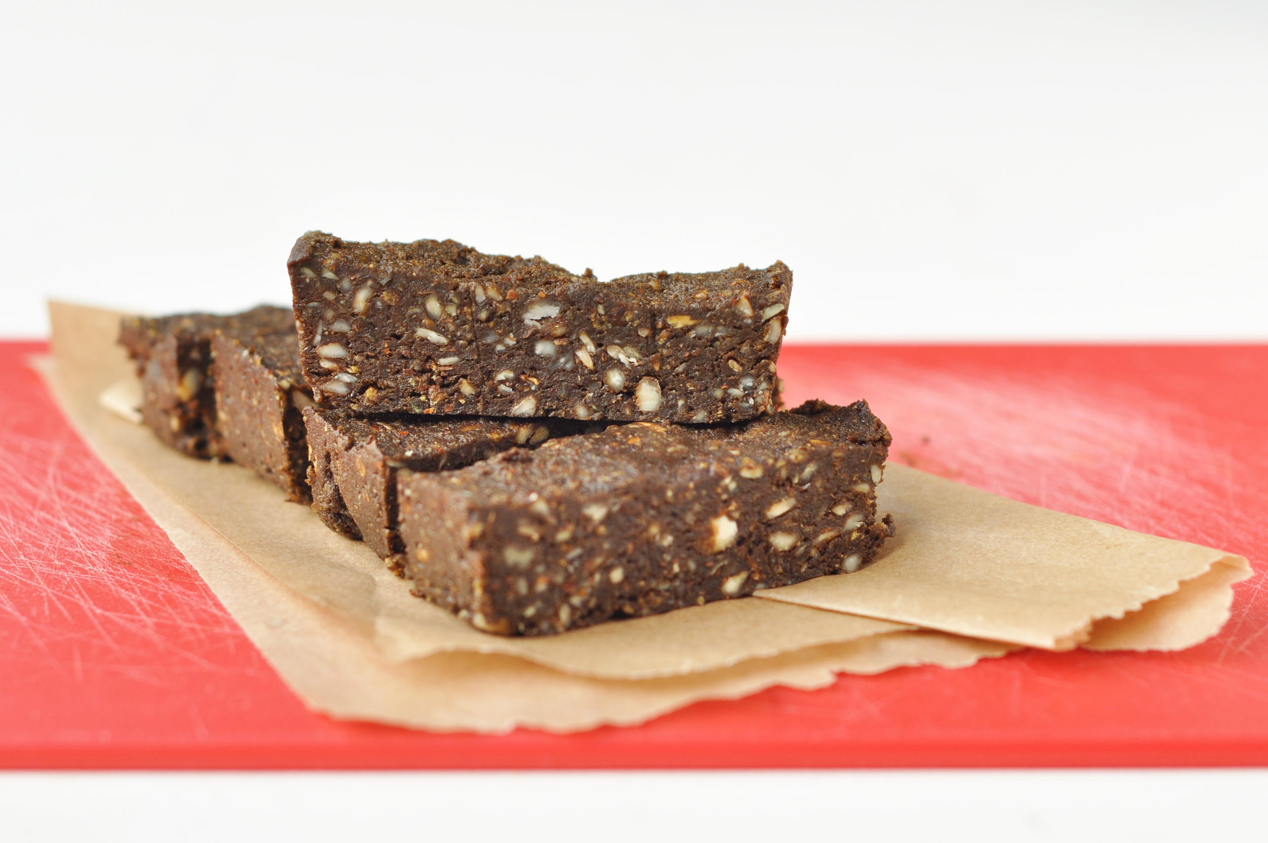 “Soft and crunchy bars with a touch of chocolatey indulgence. A great way to boost your protein after a workout!”