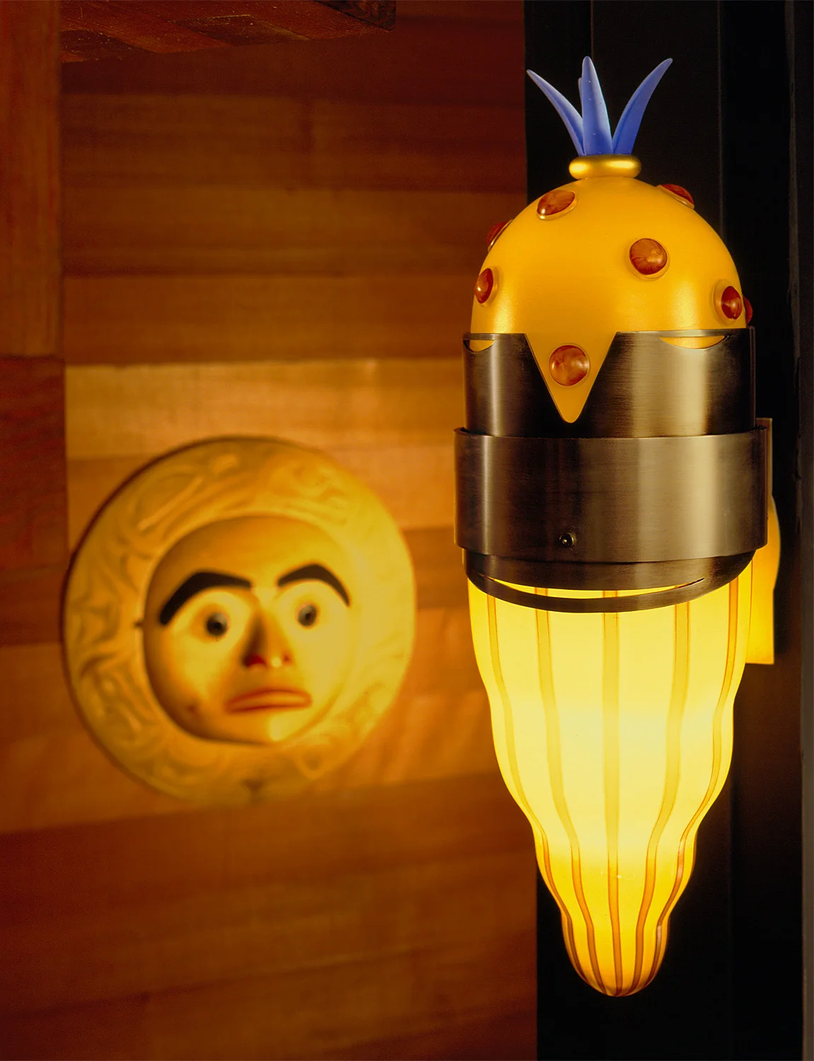 Mask Sconce 2001. (1 of 9) Cast glass, nickel and gold plated bronze. 15 x 5 x 6½" Private residence, Long Beach, CA