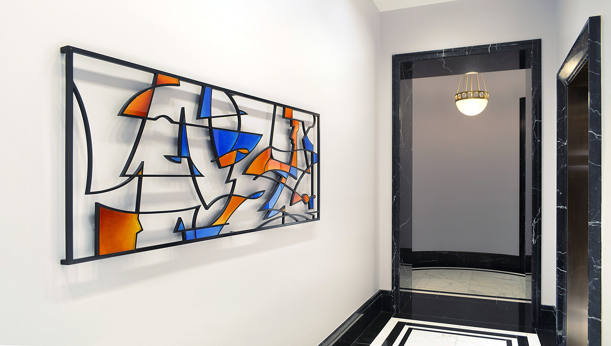 Inquiring 2016. Cast glass, aluminum. 38½ x 85 x 2" Residential tower lobby, New York, NY