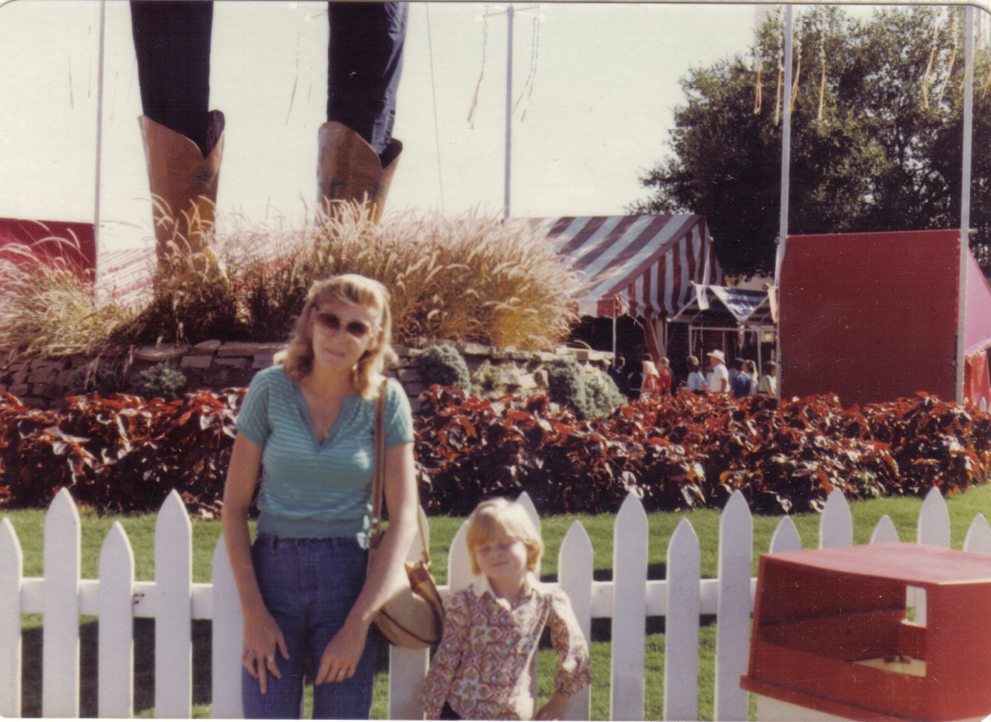 Mom and I in front of Big Tex. Some time in the late 70s or early 80s because that is an AWESOME paisley shirt I've got going on. BONUS PLOT SWAP for you: The position of her right hand is not an accident. Let your mind play with that for a little while. I'd seen this picture throughout my entire life and was in my 30s before I ever noticed. 