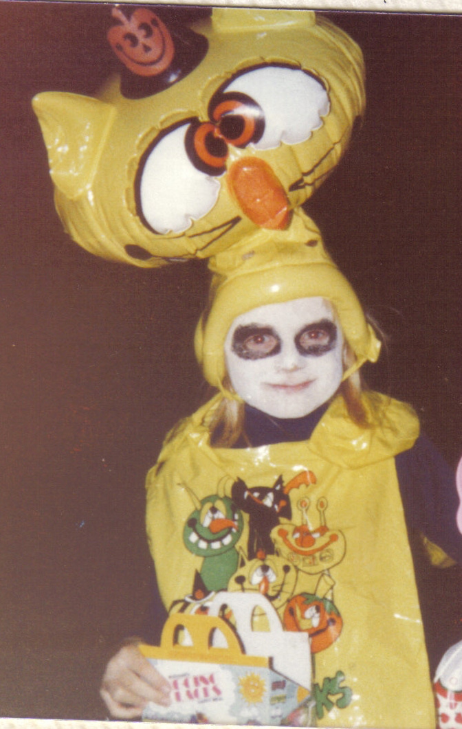 I distinctly remember the blow-up head. I have NO IDEA what this costume is, though. The 80s were a confusing time to be young.