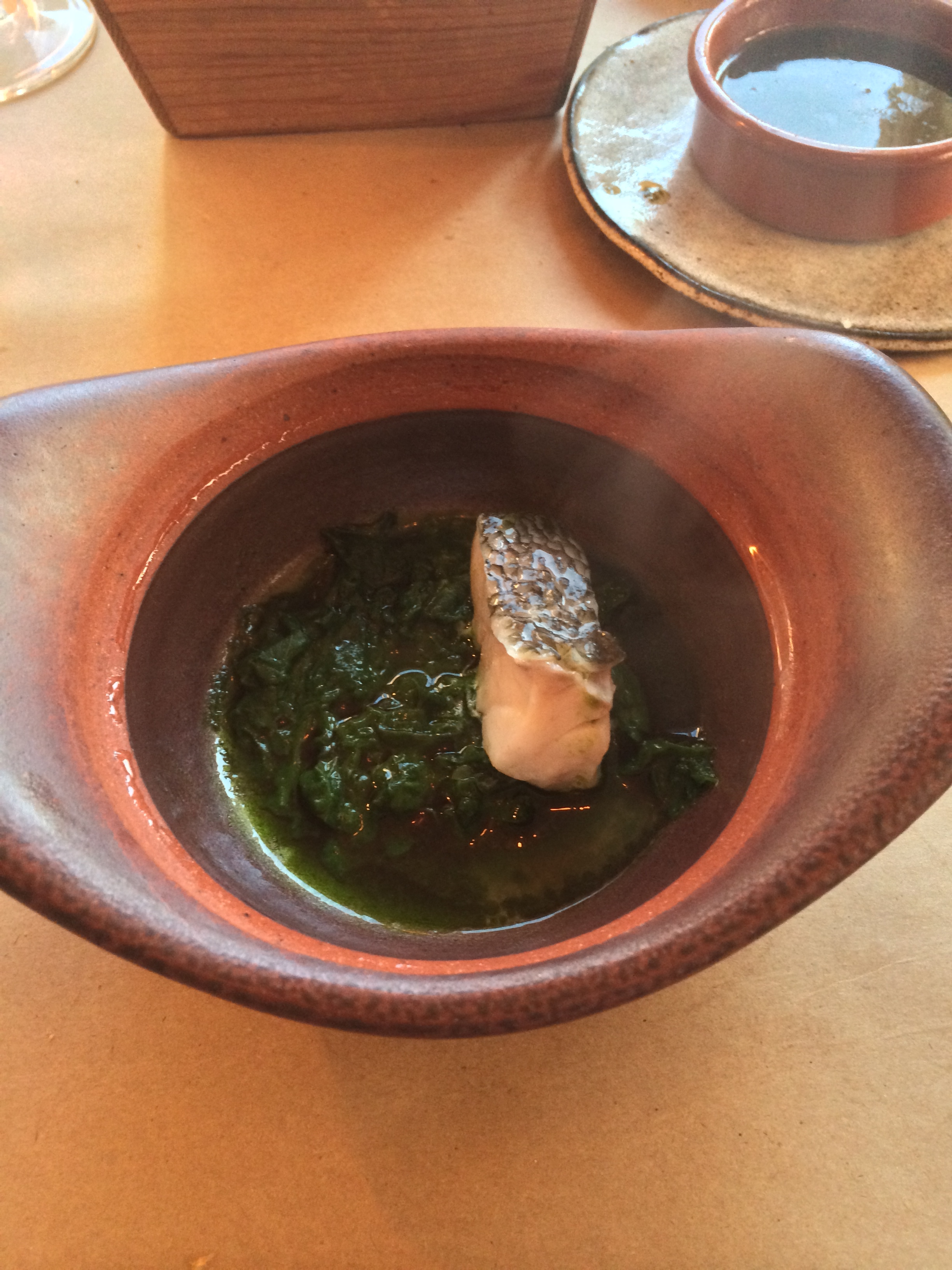 Rockfish steamed in parsley and lovage.