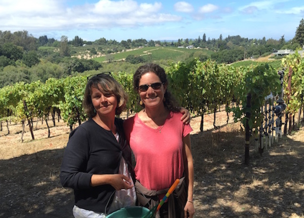 Beautiful day, walking in a vineyard with my bestie—life is good!