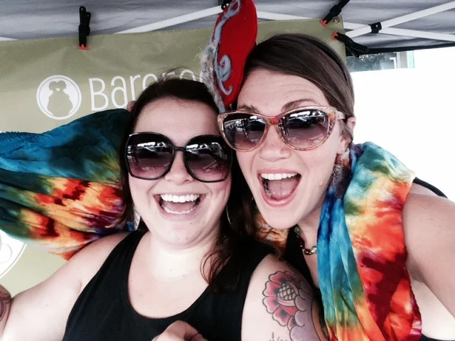 Letting our fun flags fly! Our booth was right by the stage--we missed the drag show but got to enjoy the music!