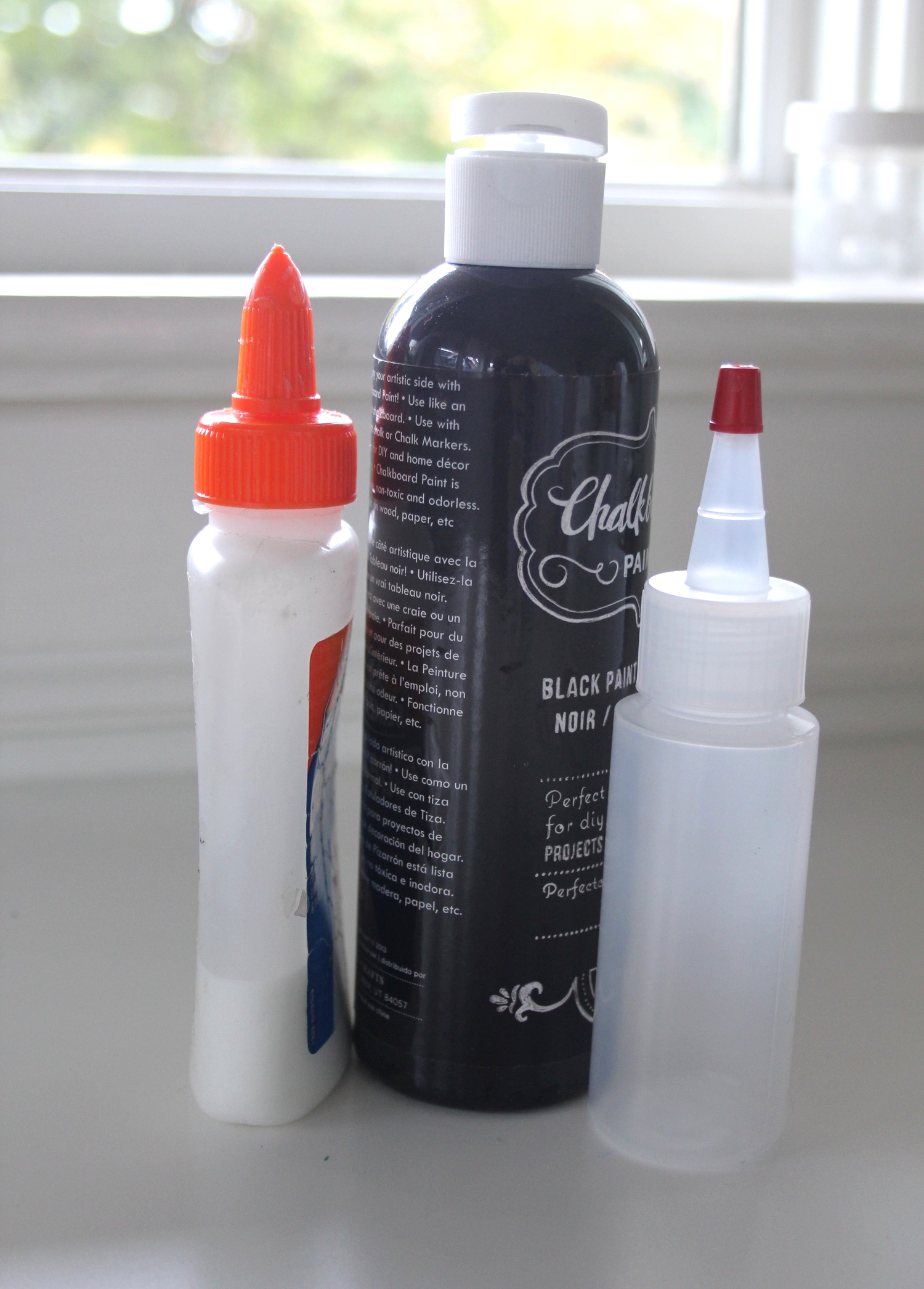 Mix 2/3 glue with 1/3 tempera paint in an existing glue bottle or any type of squeeze bottle. Shake well! Sturdy paper is a good idea since the glue is heavy as it dries. Start squeezing!! You might try a few practice squeezes to see how fast the glue flows. Less is more for quicker drying time!