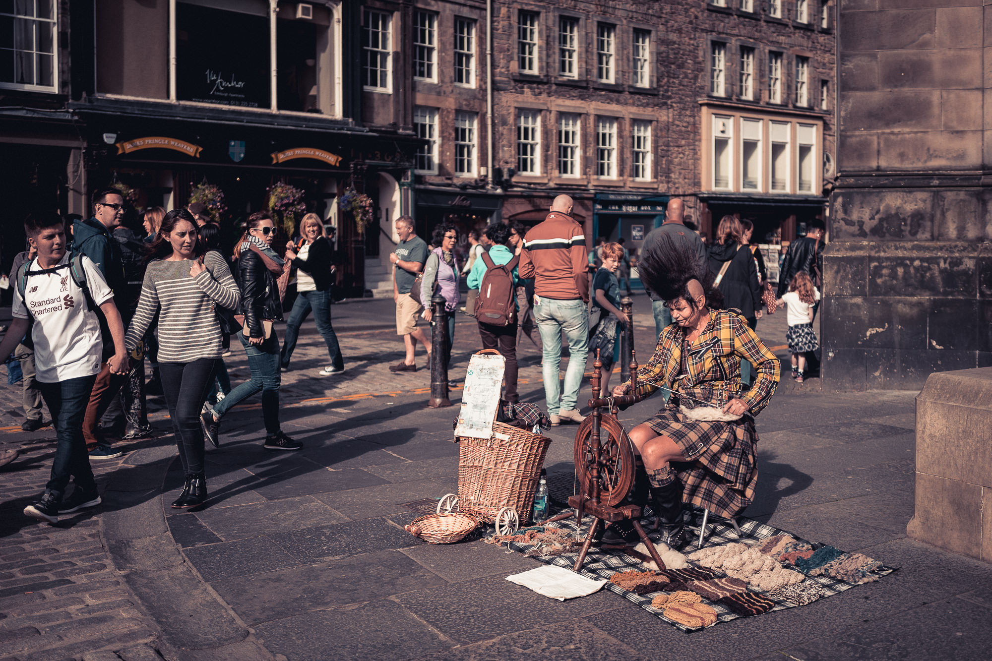 tartan-clad yarn spinner on the street