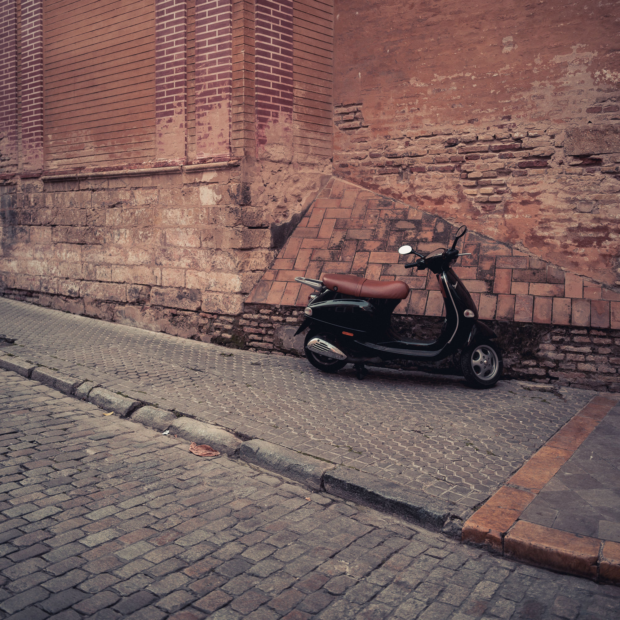 classic scooter in a classic town