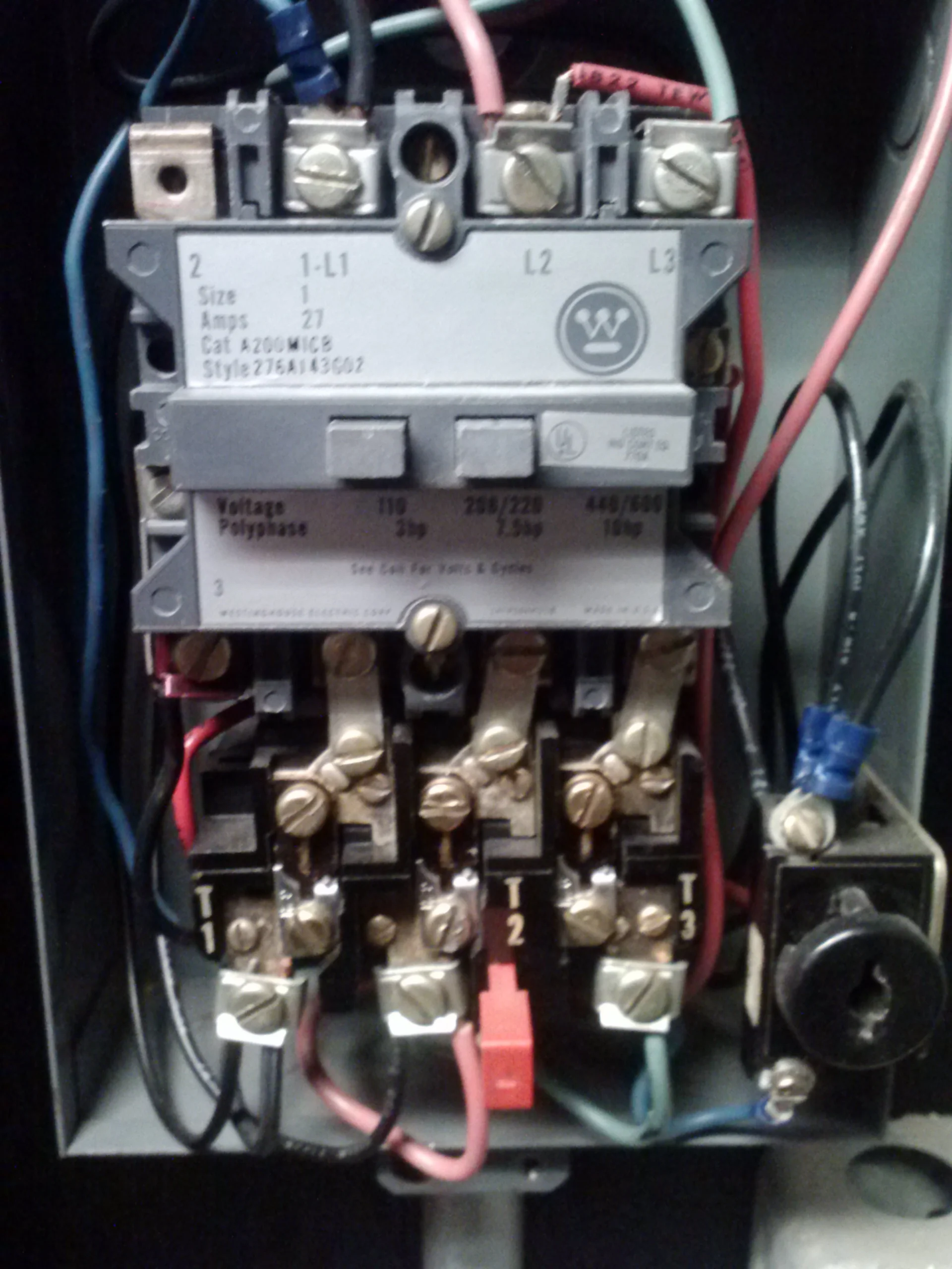 Part III and VII. This is the inside of the motor controller. Contacts on top and starter with overload protection on the bottom.