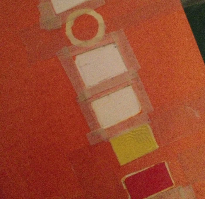 Masking the detail where the word 'contents' should be; I like the 'puckered' yellow paint!
